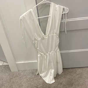 dress on the right in second picture, white tank top short dress.